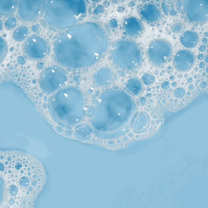 Close-up of blue bubbles from Miara Rice Powder Soap  on a blue background