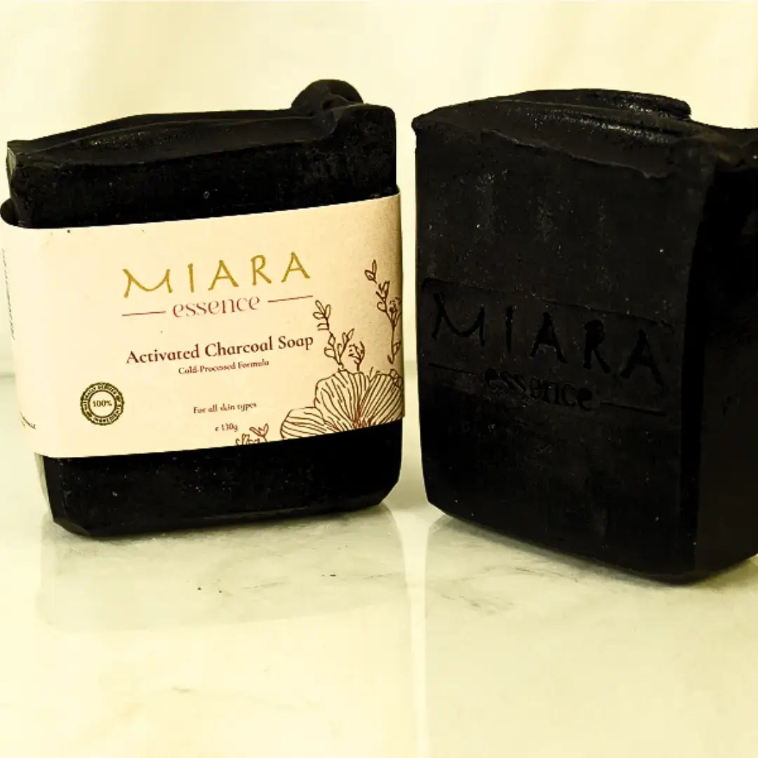 Miara Essence Activated Charcoal soap bar with 'Miara' branding on a white background