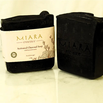 Miara Essence Activated Charcoal soap bar with 'Miara' branding on a white background