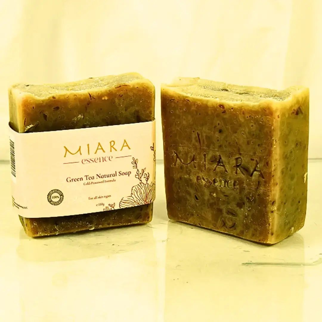 Miara Essence Green Tea Natural Soap displayed on a reflective surface, showcasing its natural and antioxidant properties.