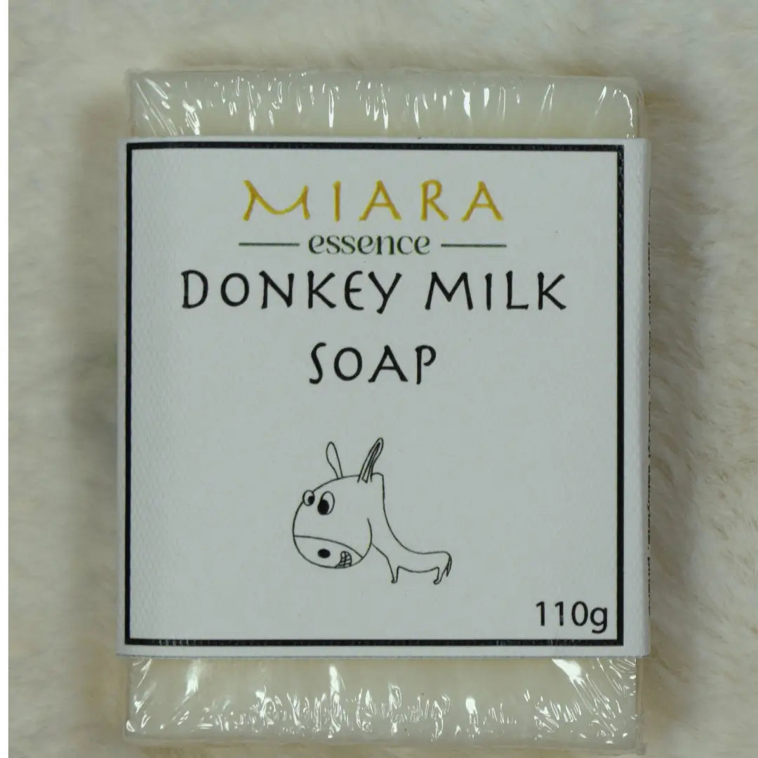 Donkey milk soap bar with 'MIARA essence' packaging on a light background