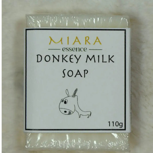 Donkey milk soap bar with 'MIARA essence' packaging on a light background