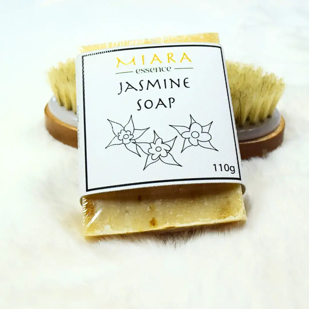 Natural Jasmine Soap - Miara Essence Jasmine Soap bar with floral design and natural bristle brush.