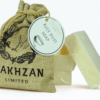 Rice powder soap with a drawstring bag labeled Makhzan Limited' on a white background